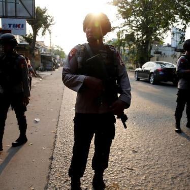 A group of mobile brigade policemen patrols near the Mobile Police Brigade (Brimob) headquarters in Depok, south of Jakarta, Indonesia, May 9, 2018.