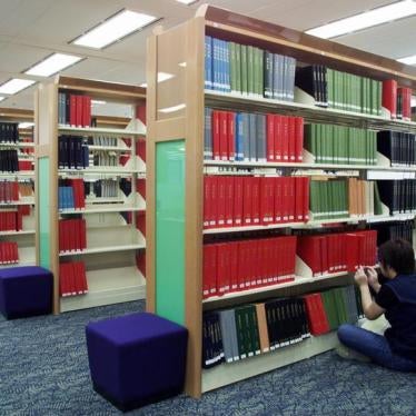A library worker indexes periodicals at the Hong Kong Central Library May 14, 2001. 