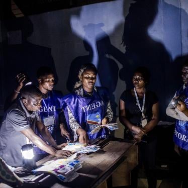 A polling official counts votes in a school in Kinshasa after the Democratic Republic of Congo’s general elections, December 30, 2018.
