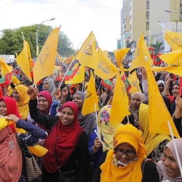 Supporters of challenger Ibrahim Mohamed Solih celebrate his victory in the presidential election, Malé, Maldives, September 24, 2018.
