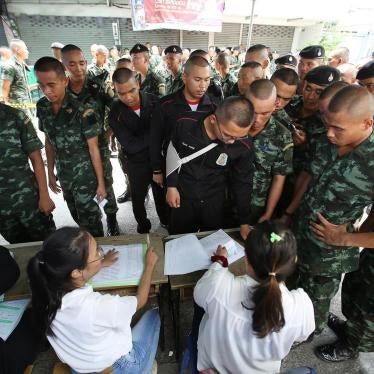 Soldiers line up for voting in general election at a polling station in Bangkok, Thailand, Sunday, March 24, 2019. Nearly five years after a coup, Thailand was voting Sunday in a long-delayed election that sets a military-backed party against the populist