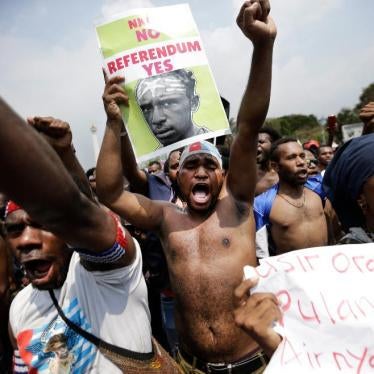 Papuan activists shout slogans during a rally near the presidential palace in Jakarta, Indonesia.
