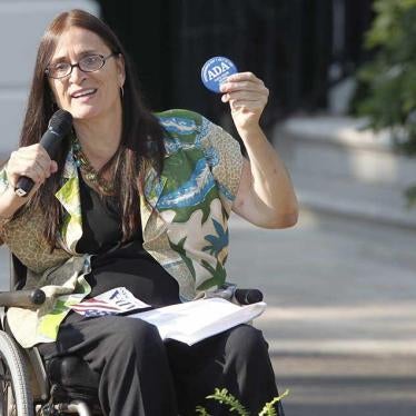 Marca Bristo, President of Access Living, speaks at an event marking the 20th anniversary of the Americans with Disabilites Act in Washington