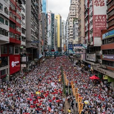 Protesters march on a street during a rally against the extradition law proposal on June 9, 2019 in Hong Kong. 